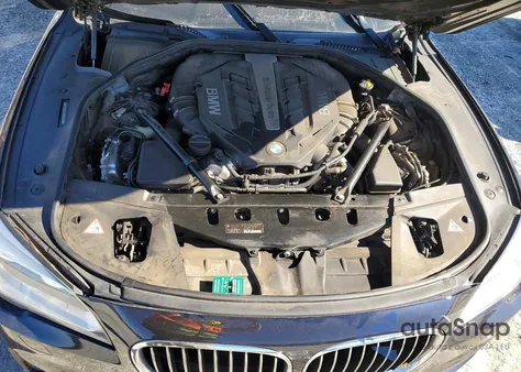 2015 BMW 750 I z USA, uszkodzony, nr VIN WBAYA8C58FD825448